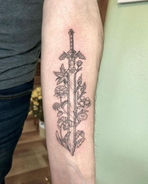 Ally A on Instagram: "Master Sword and Breath of the Wild plants Thank you! • • • • • • • • • • • • • • • • • • • • • • #zelda #zeldabreathofthewild #link #nintendo #anime #animetattoo #animetattoos #manga #mangatattoo #linework #fineline #sword #swordtattoo #illustration #illustrativetattoo #botanical #mastersword" Lotr Tattoo, Zelda Tattoo, Inner Forearm Tattoo, Wild Tattoo, Skeleton Hand Tattoo, Petite Tattoos, Tattoo Photography, Floral Tattoo Sleeve, Cute Little Tattoos