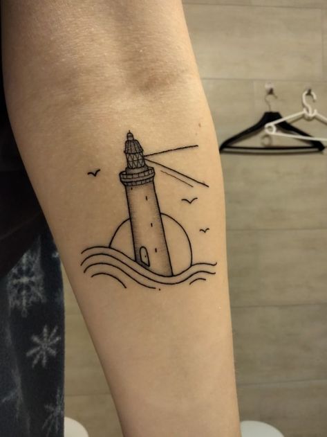 The Art of Travel: Exploring the World of World Traveler Tattoos | Aesthetic & Unique Tattoo Ideas Lighthouse Tattoo Ideas, Traveler Tattoos, Small Travel Tattoos, Lighthouse Tattoo Meaning, Lighthouse Tattoos, Adventure Tattoo, Lighthouse Tattoo, Tattoo Meanings, Beacon Of Hope