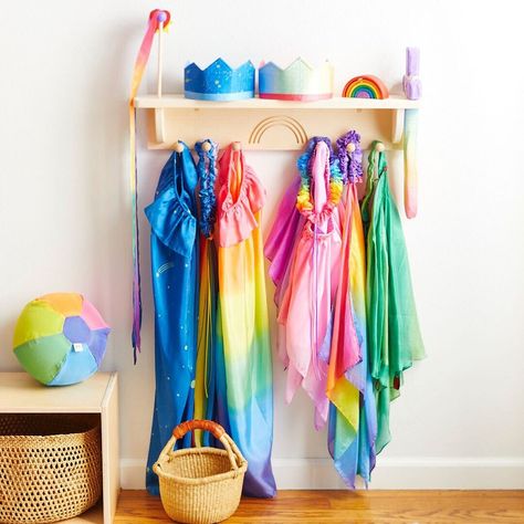 Our NEW Wooden Dress-up Display! The perfect addition to your playroom and invites hours of open-ended play!🌈 ⭐ 6 pegs to hold your dress-ups ⭐ 1 slot to fit your soft silk sword ⭐ 3 holes to display your streamers #sarahssilks #dressup #playsilks #playroom #openendedplay Montessori Room Ideas, Wooden Dress, Dress Up Area, Scarf Rack, Montessori Room, Christmas World, Traditional Toys, Play Furniture, Open Ended Play