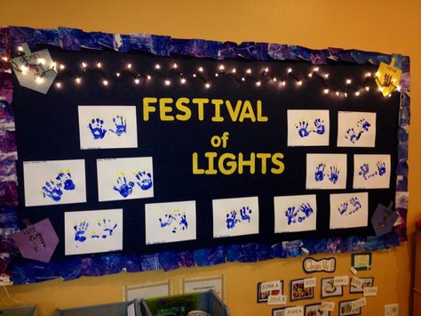 Hanukkah board w/ hand print menorahs and a strand of lights. #hanukkah #chanukah #classroom #decorations Hanukkah Classroom Decorations, Decorating For Hanukkah, Hannukah Bulletin Boards, Hanukkah Bulletin Board Ideas, Hanukkah Bulletin Board, Hanukkah Lessons, Hanukkah Preschool, Hanukkah Lights, Christmas Bulletin Boards