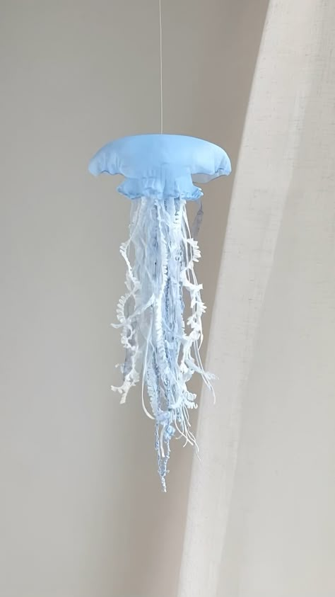 Handmade fluffy jellyfish using carefully selected Japanese materials. Jellyfish Mobile Diy, Making A Jellyfish, Jellyfish Bottle Craft, Diy Jelly Fish Decor, How To Make Jellyfish, Ghibli Inspired House, Cardboard Jellyfish, Fabric Jellyfish, Clay Jellyfish