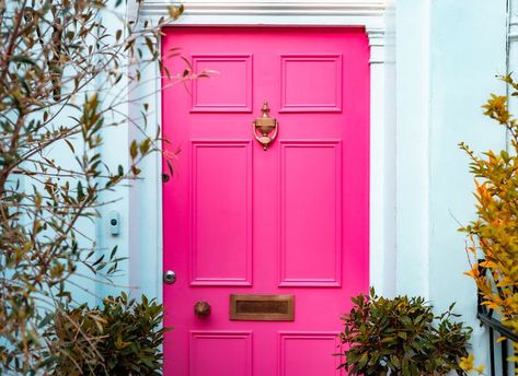 What Your Front Door Color Says About Your Personality Hot Pink Door Exterior, Lilac House Exterior, Hot Pink Front Door, Magenta Front Door, Pink Door Exterior, Fun Front Door Colors, Pink Front Doors, Brick Ranch Exterior, Colorful Front Door