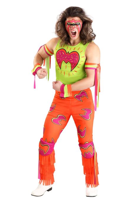 PRICES MAY VARY. Officially Licensed WWE Costume: Step into the ring as the legendary Ultimate Warrior with this officially licensed WWE costume for men. Featuring vibrant colors, fringe details, and authentic sublimated graphics, this costume brings the high-energy spirit of one of the greatest wrestling icons to life. Complete Ultimate Warrior Look: This set includes everything you need for the ultimate transformation—shirt, tights, arm ties, wrist bands, knee pads, and boot covers. Each piece Ultimate Warrior Costume, Wrestler Outfit, Wwe Ultimate Warrior, Wwe Costumes, Wrestling Costumes, Costume For Men, Costume Boots, Sports Costume, Warrior Costume