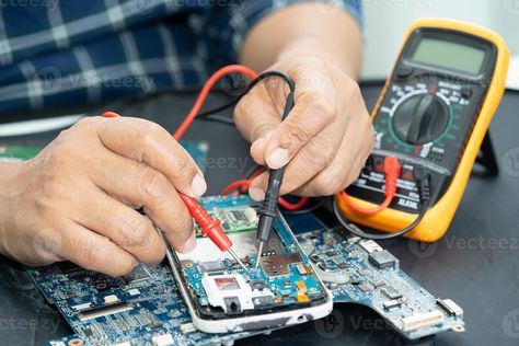 Technician repairing inside of mobile phone by soldering iron. Integrated Circuit. the concept of data, hardware, technology. Learn Car Driving, Electronic Technician, Macbook Repair, Integrated Circuit, Cell Phone Screen, Cell Phone Repair, Samsung Device, Soldering Iron, Event Promotion