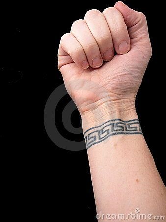 Fist With Wrist Tattoo in Greek Key Pattern over Black Background by Rebekah  Burgess, via Dreamstime Greek Pattern Tattoo, Greek Key Tattoo, Arms Reference, Best 3d Tattoos, Wrist Band Tattoo, Trident Tattoo, Tattoo On Wrist, Meaningful Wrist Tattoos, Key Tattoo