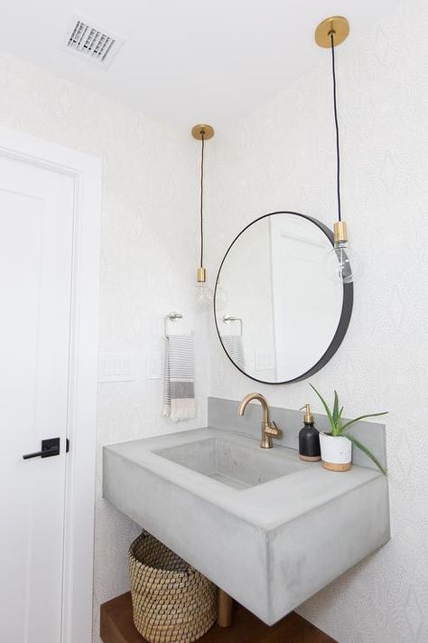 Stunning powder room enhanced with a concrete floating sink vanity and brushed gold faucet. Floating Sink Vanity, Concrete Bathroom Vanity, Asian Bathroom, Floating Sink, Gold Faucet, Bathtub Tile, Concrete Bathroom, Toilet Sink, Contemporary Bathroom Designs