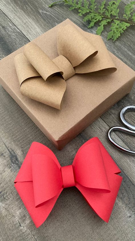 Add a touch of handmade charm to your gifts with a spectacular paper bow! Full video viewable through link. ❤️ . . . #paperbow #diybow #papercrafts #christmas #christmascrafts #bow Diy Gifts Wrapping Ideas, Paper Bows Diy Templates, Wrapping A Large Gift Ideas, Bows Out Of Wrapping Paper Diy, Wrapping Paper Ribbon, Homemade Gift Wrapping, Bow On Present Wrapping, Gift Wrap Bow Ideas, Bow For Christmas Present