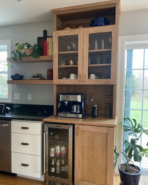 Kitchen before and after! ✨ Have an awkward space where your kitchen cabinets end? I had 35” of wall space to the sliding door to create this custom coffee bar area with mini fridge and pull out drawers for booze storage. 👉🏼 swipe for the before! #beforeandafter #kitchendesign #coffeebar #kitchenremodel #cabinetmaker #openshelves #kitchenorganization #furnituremaker Bar Cabinet With Fridge, Custom Coffee Bar, Coffee Hutch, Coffee Bar Area, Pull Out Drawers, Bar Area, Bar Areas, Mini Fridge, Custom Coffee