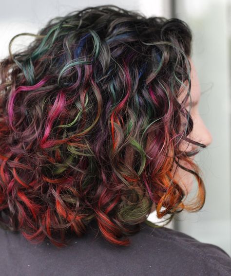 My two favorites, rainbows and curls. It just does it for me every time 😩🤌🏻 Proof that yes, you can have healthy, and vibrant curly vivid hair. You just have to come see me for it 😉 Vivid Hair Color Curly, Colored Highlights Curly Hair, Multicolor Curly Hair, Vivid Curly Hair, Curly Vivid Hair, Curly Green Hair, Curly Hair Vibrant Color, Curly Hair Peekaboo Color, Curly Hair Rainbow Highlights