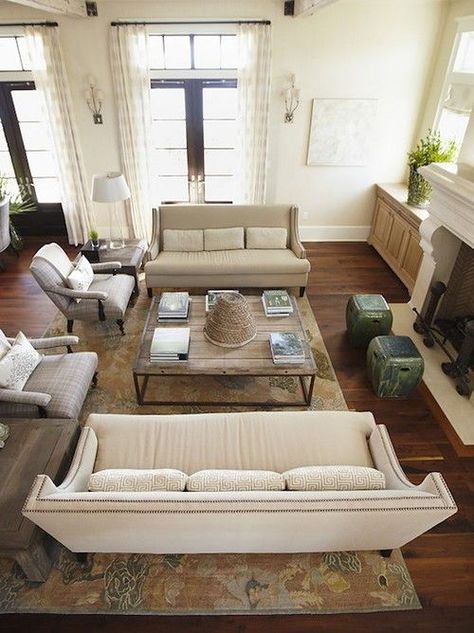 Why You Should Arrange Two Identical Sofas Opposite Of Each Other ➤  http://CARLAASTON.com/how-to-arrange-sofas-to-design-intimacy #couch  #furniture Monochromatic Rooms, Conversation Room, Conversation Area, Furnitur Ruang Keluarga, Creek House, Living Room Furniture Layout, Sala Grande, Living Room Furniture Arrangement, Living Room Arrangements