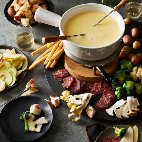 7 Things to Bring Your Family Together This Winter | Hunker Best Cheese Fondue, Cheese Fondue Recipe, Fondue Recipes Cheese, Peasant Bread, Fondue Party, Fondue Recipes, Festive Food, Fondue Pot, Savoury Recipes