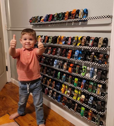 I Made A Wall Rack To Store/Display My Kid's Monster Trucks. For Less Than 20 Bucks, I Used Curtain Rods And Checkered Flag Duct Tape Monster Truck Bedroom, Monster Truck Room, Truck Bedroom, Duct Tape Diy, Truck Images, Truck Room, Monster Truck Toys, Truck Storage, Cars Room