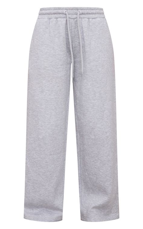 Take on those chilled days in style with these petite ash grey high waist wide leg joggers. Brought to you in an ash grey material with a high waist design and a wide leg fit, what's not to love? Style these petite joggers with the matching top, trainers and simple accessories for a look you will be reaching for again and again. Length approx 81cm/32inch (Based on a sample size XS) Model wears size XSModel Height - 5ft 4inchp]:!mb-0inch>Category: SweatProduct type: Wide Leg JoggersColour: Ash GreyMaterial: Loopback SweatDesign: PlainOccasion: Day