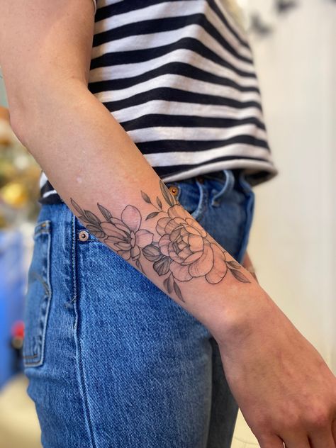 Wrist Half Sleeve Tattoos, Top Of Wrist Flower Tattoo, Magnolia Tattoo Wrist, Quarter Sleeve Floral Tattoo, Peonies Tattoo Wrist, Forearm Peony Tattoo, Peony Wrap Around Tattoo, Small Peony Wrist Tattoo, Peony Forearm Tattoo Women