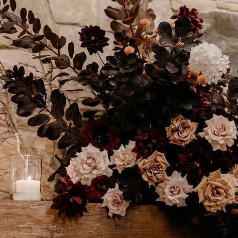 Tegan O'Brien : Floral Design and Styling on Instagram: "Emma and Ricardo’s moody fireplace arrangement.   Photographer: @blaisebell  Venue: @cafe_enzohuntervalley  Film: @morelifefilms  Planner: @yourdaybychloe  Celebrant: @marriedbyallegra   ⁠ ⁠ ⁠ ⁠ ⁠ ⁠ ⁠ ⁠ ⁠ ⁠ ⁠ ⁠ ⁠ ⁠ ⁠ ⁠ ⁠ ⁠ ⁠ ⁠ ⁠ ⁠ ⁠ ⁠ ⁠ ⁠ #hanginginstallation #flowerinstallation #thelillipillian #hangingflowers #floralinstallation #bridaltableinstallation #weddingflowers #weddingceremony #ceremonyflowers #thegables #statementflowers #weddingdetails #realwedding #sydneywedding #weddingflorist #sydneyweddingflorist #australianwedding #australianflorist #sydneyflorist #southernhighlandswedding #greyleighkiama #greyleighwedding #hangingflowerinstallation #bendooleyweddings #bendooleyestate #bowralweddingvenues #floralstyling #weddingstyl Moody Floral Centerpiece, Bridal Bouquet Moody, Dark Floral Arrangements, Moody Fireplace, Academia Wedding, Dark Academia Wedding, Moody Wedding Flowers, Dark Romantic Wedding, Floral Christmas Tree