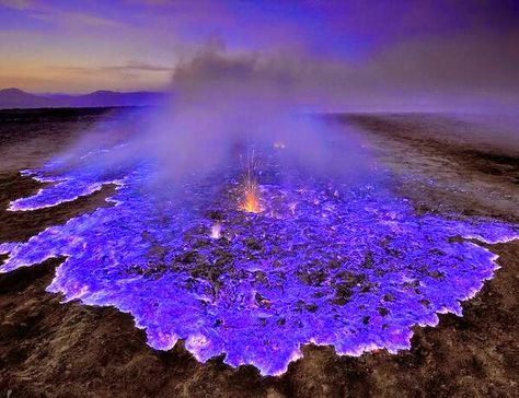 Spectacular Neon Blue Lava Pours From Indonesia's Kawah Ijen Volcano At Night (PHOTOS) | Geology IN Dallol Ethiopia, Vulcano Che Erutta, Blue Lava, East Java, Lava Flow, Unusual Things, Night Photos, Blue Flames, Natural Phenomena