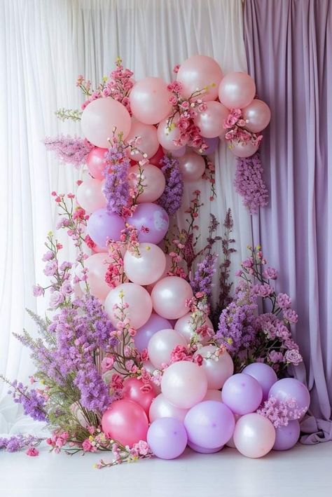 Purple Balloon Garland With Flowers, Wisteria Balloon Arch, Bloom Themed Party, Floral And Balloon Backdrop, Pink And Purple Decorations Party, Wild Flower Balloon Arch, Wildflower Balloon Garland, Pink And Purple Baby Shower Ideas, Purple And Pink Baby Shower