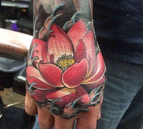 #hand #tattoos #handtattoos Lotus Hand Tattoo, Japanese Hand Tattoos, Hand Tattoo Designs, Feminine Skull Tattoos, Japanese Flower Tattoo, Cherub Tattoo, Lotus Tattoo Design, Knuckle Tattoos, Aztec Tattoo