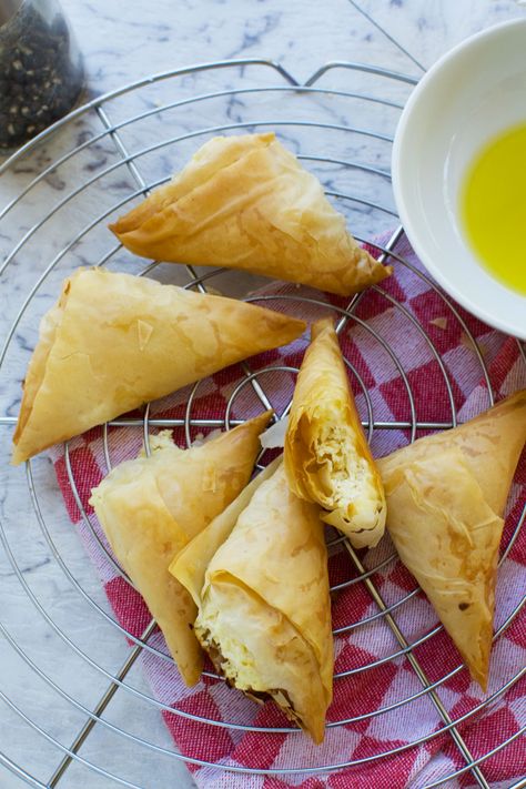 Tiropita (mini feta cheese triangles) - Scrummy Lane Tiropita Recipe, Greek Cheese Pie, Cheese Triangles, Balkan Food, Greek Recipes Dessert, Greek Recipes Authentic, Greek Pastries, Greek Appetizers, Greek Cheese