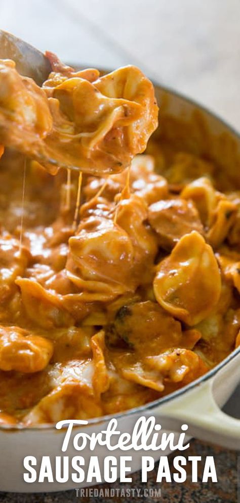 The ultimate comfort food recipe! This pasta uses cheese filled tortellini with sausage and creamy tomato sauce. Andouille Sausage And Tortellini Recipes, Smoked Sausage And Tortellini Recipes, Tortellini Recipes Sausage, Sausage Tortellini Recipes, Tortellini With Sausage, Creamy Sausage Tortellini, Pasta Tortellini, Kabasa Recipes, Cheese Tortellini Recipes