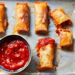 Pepperoni Pizza Rolls - EatingWell.com Pizza Wontons Baked, Wanton Wrapper Pizza, Pizza Rolls With Wonton Wrappers, Pizza Rolls With Egg Roll Wrappers, Pizza Egg Rolls Baked, Pizza Eggroll, Wonton Pizza Rolls, Casserole Pizza, Pizza Egg Rolls