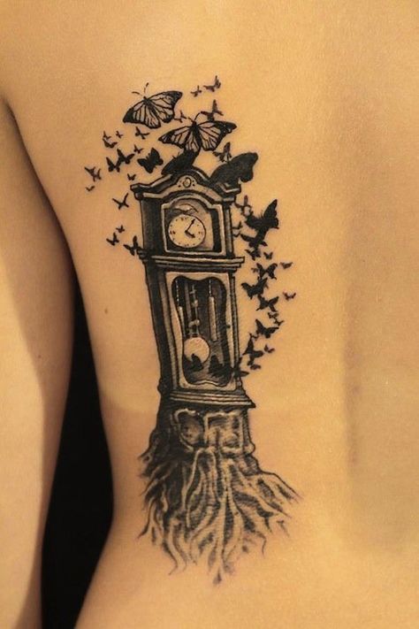 This tree morphed into a clock and became a home for butterflies. Tattoo, InkedMagazine Time Flies Tattoo, Grandfather Clock Tattoo, Flying Tattoo, Clock Tattoo Design, Clock Tattoo, Pattern Tattoo, Back Tattoos, Time Flies, Skin Art