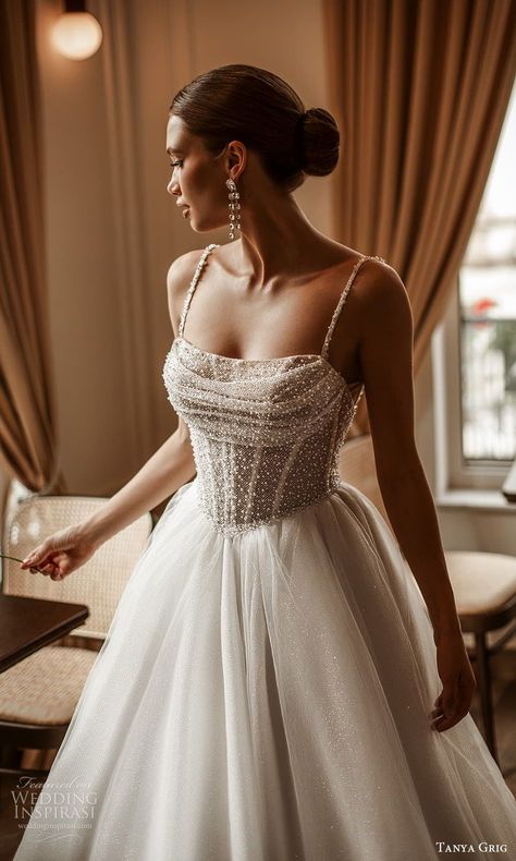 Tanya Grig 2025 Wedding Dresses — “Timeless Elegance” Bridal Collection | Wedding Inspirasi -  #Bridal #Collection #Dresses #elegance #Grig #Inspirasi #Tanya #Timeless #Wedding Check more at https://ifoundaideas.com/wedding/tanya-grig-2025-wedding-dresses-timeless-elegance-bridal-collection-wedding-inspirasi-2/ A Line Classy Wedding Dress, Wedding Dresses Top, Sweetheart Neckline Corset Wedding Dress, Wedding Dress Ball Gown Corset, Corset Wedding Dress Straps, V Shaped Wedding Dress, Corseted Wedding Gown, Clean Fitted Wedding Dress, Wedding Dress With Bodice