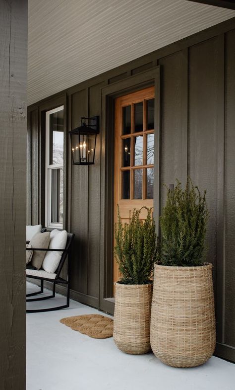 10 Most Charming Outdoor Entryway Decorating Ideas and Tips Two Door Front Porch Ideas, Front Porch Decor Ranch Style House, Front Door Container Ideas, Garage Outdoor Decor, Modern Farmhouse Front Porch Decor Ideas, Organic Home Exterior, Timber Front Porch, Organic Modern Front Door, Large Front Porch Furniture Ideas