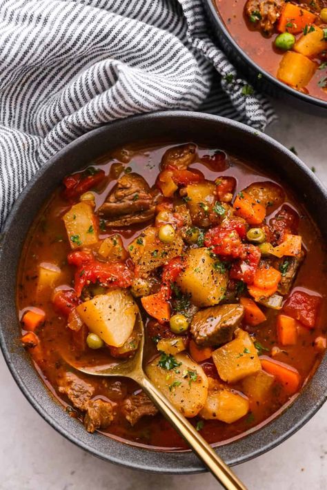 This hearty Vegetable Beef Soup is comforting and flavor-packed! It's loaded with beef, potatoes, and veggies that simmer to tender perfection. A classic and easy one-pot soup for a chilly night. Spicy Vegetable Beef Soup, Stew Meat Vegetable Soup, Best Vegetable Beef Soup, Vegetable Soup With Beef, Vegetable Soup With Ground Beef, Veg Beef Soup, Steak Soup Recipes, Potatoes And Veggies, Steak Soup