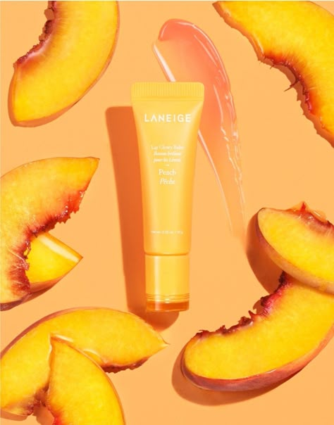 Summer Product Photography, Laneige Lip Glowy Balm, Lip Glowy Balm, Ingredients Photography, Peach Lip Balm, Glossier Lip Balm, Truly Beauty, Peach Lemonade, Laneige Lip