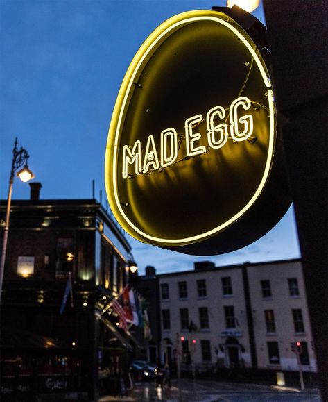 External logo of casual restaurant located at the southern end of Camden Street in Dublin ,Ireland designed by Jennings Design Studio. Main architects: Peter McEleney & Jakub Durek. Egg Restaurant Design, Store Front Sign, Yellow Restaurant, Egg Restaurant, Camden Street, Casual Restaurant, Blade Sign, Light Box Sign, Sign Board Design