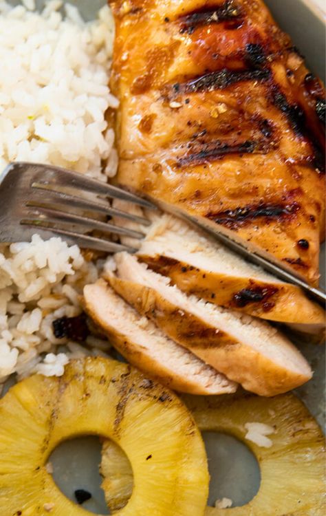 Hawaiian grilled chicken dinner is a tropical treat on a hot summer night! Pineapple lime marinade perfectly compliments the honey ginger glaze, and it's all served with this easy coconut rice and caramelized pineapple rings! #summergrilling Blackstone Pineapple, Grilled Chicken With Pineapple, Easy Coconut Rice, Hawaiian Grilled Chicken, Grilled Chicken Dinner, Chicken With Pineapple, Grilled Pineapple Chicken, Lime Marinade, Ginger Glaze