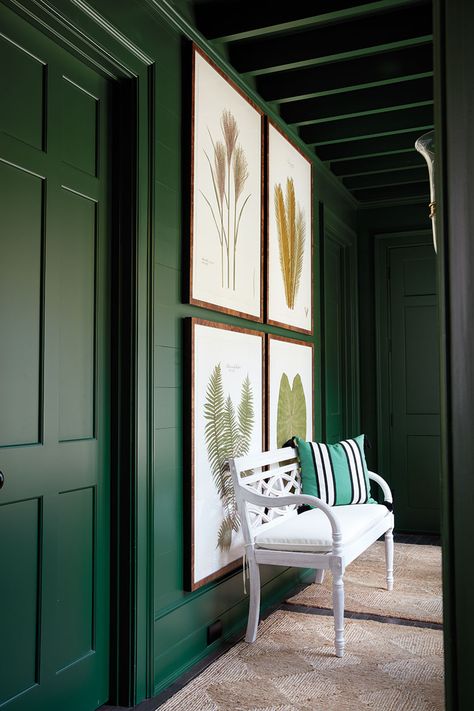 Bill Ingram's green hallway in the 2016 Southern Living Idea House, emerald green walls with large grid arrangement of art of flora Wall Colours For Hall, Dark Green Hallway, Bill Ingram, Southern Living Idea House, Best Wall Colors, Green Wall Design, Hallway Paint, Green Hallway, Door Paint Colors