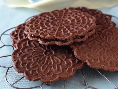 Chocolate Peppermint Pizzelle Recipe | Food Network Kitchen | Food Network Pizzelle Cookies, Pizzelle Recipe, Italian Cookies, Italian Desserts, Chocolate Peppermint, Vegetarian Chocolate, Food Network, Christmas Baking, Bars Recipes