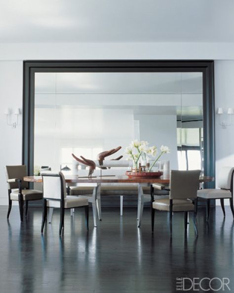 Unique Mirrors - One Of A Kind Mirrors - ELLE DECOR AN OVERSIZED MIRROR  In the dining area of an Upper East Side apartment designed by Vicente Wolf with associate David Rogal, a wood-and-steel table by Wolf is surrounded by 1940s Dominique armchairs and Ruhlmann side chairs; the oversize wood-frame mirror and double-arm sconces also are by Wolf, and the 19th-century carved-wood hands are from Thailand. West End Girls, Upper East Side Apartment, Mismatched Dining Chairs, Mirror Dining Room, Room Mirror, Dining Room Contemporary, Big Mirror, Dining Room Walls, A Mirror