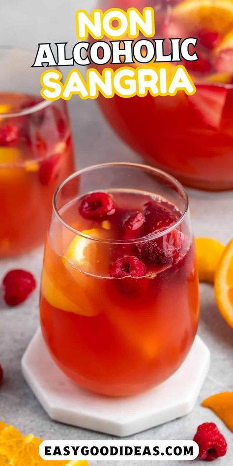 Non Alcoholic Sangria is a mocktail where you won't miss the wine! This delicious party punch is perfect for everyone. Sangria Without Alcohol, Nonalcoholic Christmas Sangria, Non Alcoholic Sangria Punch, Non Alcoholic Sangria Fall, Mocktails Non Alcoholic Sangria, Christmas Sangria Non Alcoholic, Virgin Sangria Recipes Non Alcoholic, Non Alcohol Sangria, Non Alcoholic Batch Drinks