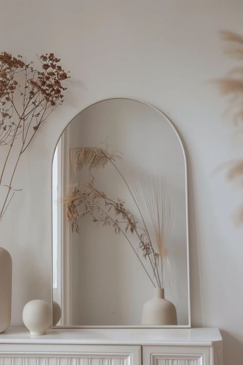 Looking to add a touch of elegance to your home? Check out these stylish arch mirror decor ideas that can enhance and beautify any room! From living rooms to bedrooms, discover unique ways to incorporate these stunning mirrors into your interior design. Whether you prefer minimalist or boho styles, arch mirrors can perfectly complement your decor. Get ready to transform your space with ideas that not only look fantastic but also create beautiful reflections and bring light into every corner. Inspired yet? Let’s beautify your home! Arch Mirror Decor, Arch Mirrors, Mirror Decor Ideas, Mirror Inspiration, Backyard Balcony, Arched Mirror, Arch Mirror, Online Interior Design, Mirror Designs