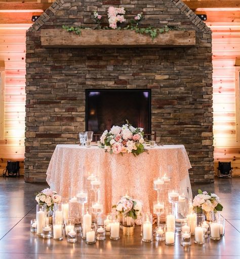 Pink and white wedding reception decor at Rolling Meadows Ranch in Cincinnati. Sweetheart table with candles, peonies and roses in bridal bouquet. Rose gold wedding. #cincinnatibride #cincinnatiwedding Sweetheart Table With Candles, Rolling Meadows Ranch, White Wedding Reception Decor, Table With Candles, White Wedding Reception, Rose Gold Wedding Decor, Pink And White Wedding, Blush Decor, Peonies And Roses