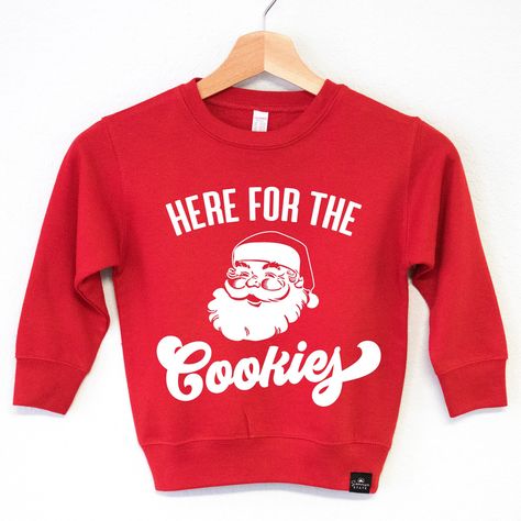 "HERE FOR THE COOKIES" Santa Claus Boy's Christmas Sweater - Boys Christmas sweatshirts The perfect boys Christmas sweatshirt for the holidays!  Sweatshirt Color: Red, or Black Sizes: 2T, 3T, 4T, 5/6T, S-YOUTH, M-YOUTH, L-YOUTH, XL-YOUTH Fabric: 60% Cotton, 40% Polyester Fleece This boy's Christmas sweater is a soft cotton fleece blend, and will keep your boy nice and warm! Sweatshirt has our signature Sonrise State tag sewn in! Kids Activewear, Sewing Tags, Perfect Boy, Boys Sweaters, Boys Christmas, Kids Sweater, Cotton Fleece, Christmas Sweatshirts, Christmas Sweater