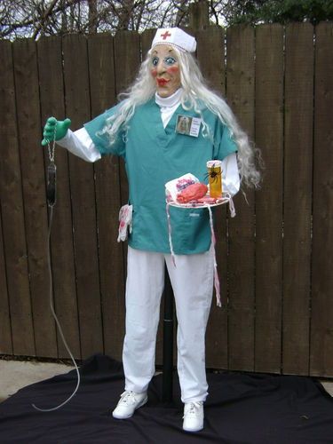 Healthcare Scarecrow Ideas, Nurse Scarecrow Ideas, Medical Scarecrow Ideas, Scarecrow Contest, Crazy Nurse, Scarecrow Ideas, Asylum Halloween, Scarecrow Decorations, Scarecrows For Garden