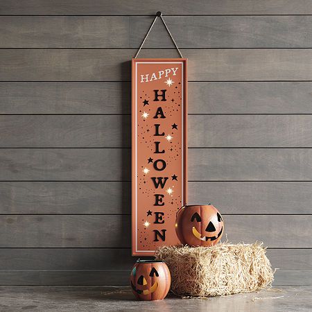 This eye-catching orange Happy Halloween sign from Layerings measures 48 inches in height adding a bold statement to your front porch or entryway. It's crafted from wood and lights up for an extra festive touch. Number of Batteries: 2Features: LightedPower Source: Battery (not Included)Use: Indoor, OutdoorMeasurements: 13.5 Width/Inches, 1.75 Depth/Inches, 48 Height/InchesWeight (lb.): 7 LbBase Material: 100% Medium-Density FibreboardFinish: PaintedBattery Size: AaCare: Wipe CleanMaterial: Wood… Happy Halloween Sign, Halloween Porch Sign, Happy Halloween Signs, Light Feature, Pumpkin Halloween Decorations, Halloween Porch, Porch Sign, Trick Or Treater, Galvanized Metal