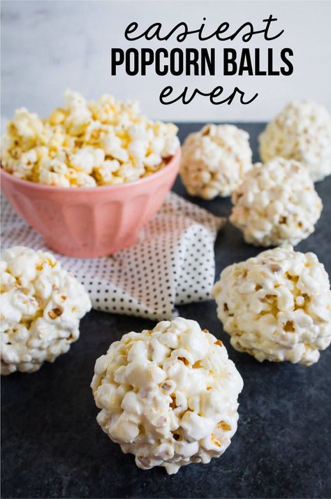 the Easiest Popcorn Balls Ever - you only need a few ingredients to make them! www.thirtyhandmadedays.com Homemade Popcorn Balls, Popcorn Balls Recipe Easy, Corn Balls, Marshmallow Popcorn Balls, Halloween Popcorn Balls, Caramel Popcorn Balls, Popcorn Balls Recipe, Popcorn Recipes Easy, Healthy Popcorn