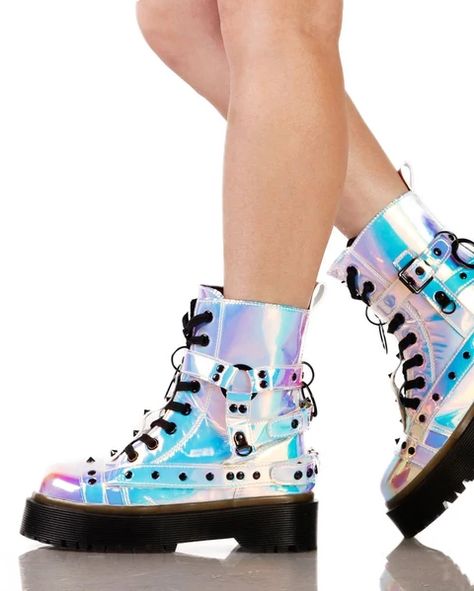 You'll be the holo hottie in our YRU Disorder Atlantis Combat Boots. These absolutely stunning iridescent ankle-length booties feature tons of trendy buckles with black lace-up closure and a treaded sole. Black rubber outsole Black cotton laces 1.5' Platform height Enameled hardware Corset Boots, Holographic Boots, Holographic Fashion, Galaxy Converse, Galaxy Vans, Led Clothing, Dolls Kill Shoes, Lucid Dreams, Kawaii Shoes