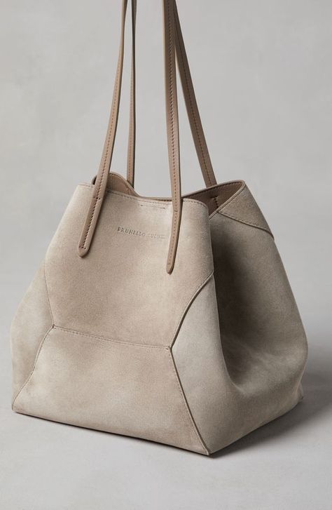 The refined suede is a compact leather with a soft, velvety texture. A leather lining completes the look of the bag. Magnetic snap closure Double handle Leather lining Detachable internal pochette with zipper Nickel-free monili decoration Bag is 47 cm (18,50") long, 20 cm (7,87") wide and 26 cm (10,24") high Antique Glasses, Fashion And Beauty Tips, Mens Eyewear, Trending Handbag, Bag Light, Eyewear Womens, Shopper Bag, Everyday Bag, Brunello Cucinelli