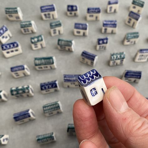 Three tiny ceramic houses . Each house is hand modelled  from white earthenware clay . The house is impressed with hand made stamps and decorated with underglaze and dark blue scraffitto design .  The houses come in a cardboard gift box . All houses are individually made and decorated so will vary slightly from the photo .   Houses measure between 1cm  and 1.5cm  tall , 1.5cm and 2cm  wide and between 0.5cm and 1cm deep approx .     Free postage. Small Ceramic Trinkets, Ceramic Small Gifts, Tiny Ceramic Houses, Mini Ceramic Houses, Tiny Clay Houses, Tiny Ceramics Ideas, Ceramics Gift Ideas, Diy Clay House, Clay Air Dry Ideas