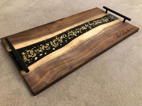 Gold Flake board with black epoxy background. Available in 18”x10” and 24”x12” Boards can be made with or without handles and we also offer laser engraving. DM to place your order today. #charcuterie #servingboard #charcuterieboard #weddinggift #giftideas #unique #quality #oneofakind #madeincanada #orangeville #ontario Wood Inlay Designs, Epoxy Charcuterie Board, Boxes Ideas, Gold Flake, Wood Building, Black Walnut Wood, Resin Ideas, Cleaning Spray, Wood Oil