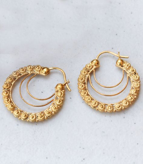 Glam up every look in your weekly rotation with the Alyssa Creolla Hoops. A modern wardrobe staple, the hoop earring receives a touch of old world opulence. Handcrafted by Filipino artisans in Ilocos using the rare art of gold filigree, a pre-Hispanic indigenous technique. Pure Sterling silver dipped in 24-karat gold Filipino Wedding, Filigree Jewelry, Heirlooms Jewelry, Modern Wardrobe, Colorful Earrings, Gold Filigree, Sustainable Jewelry, Classic Jewelry, Spiritual Jewelry