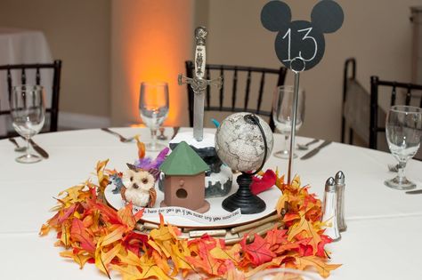 Fall Wedding With Disney Centerpieces Movie Centerpieces, Disney Centerpieces, Disney Wedding Centerpieces, Disney Love Stories, Fall Disney, Disney Fall, Wedding Disney, Enchanted Florist, Disney Bridal Showers