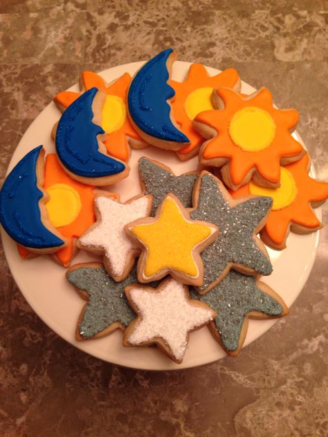 Sun,stars & moon cookies Sun And Moon Cookies, Solar Eclipse Sugar Cookies, Moon And Back Cookies, Solar Eclipse Cookies, Moon And Stars Desserts, Moon Food, Duck Cookies, Moon Cookies, Lucky Duck