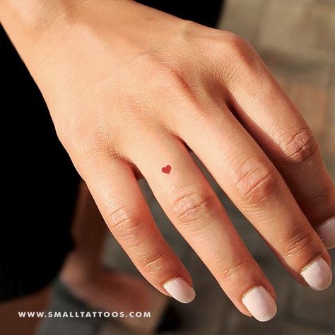 Red Heart Finger Tattoo, Red Heart Face Tattoo, Ring Tattoo Designs For Women, Marriage Tattoos Ring Finger, Penny Tattoo, Wedding Ring Finger Tattoos, Red Heart Tattoo, Tattoo Hearts, Heart Tattoo On Finger